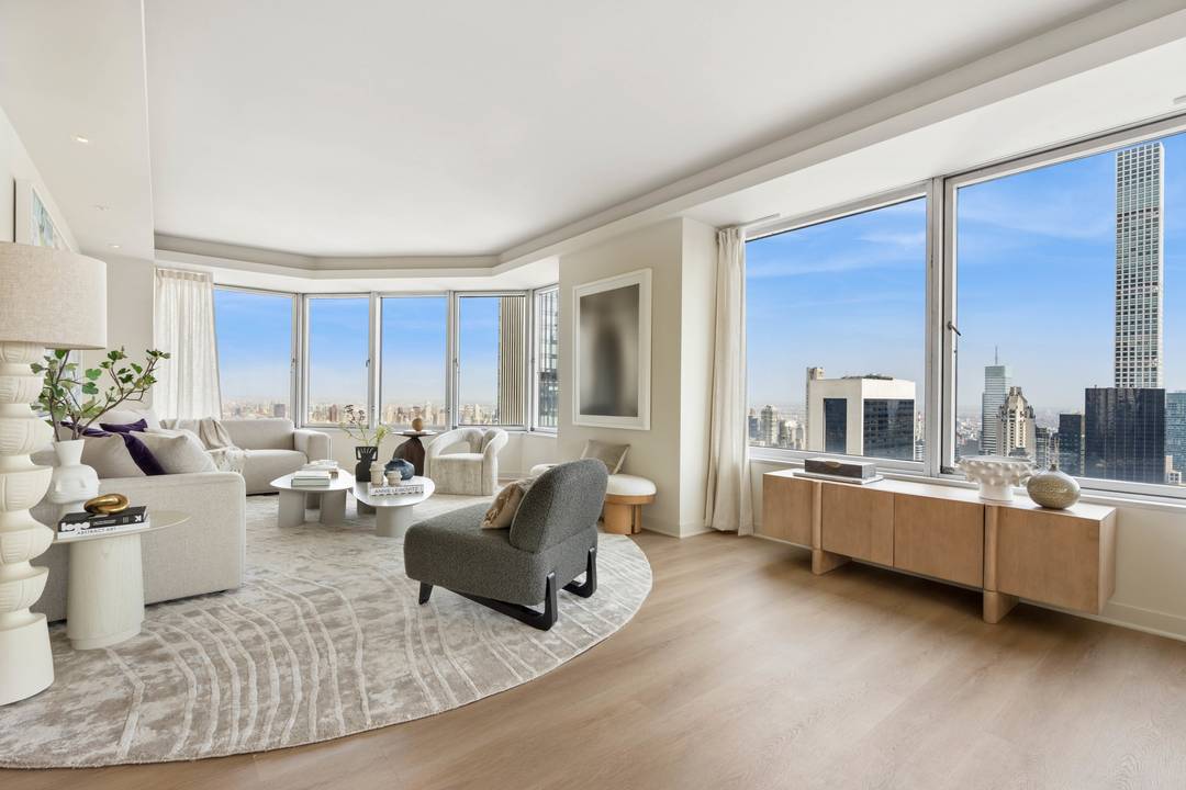 Welcome to 150 West 56th Street, Unit 6001, an exquisite high rise condo nestled in the vibrant heart of New York City !