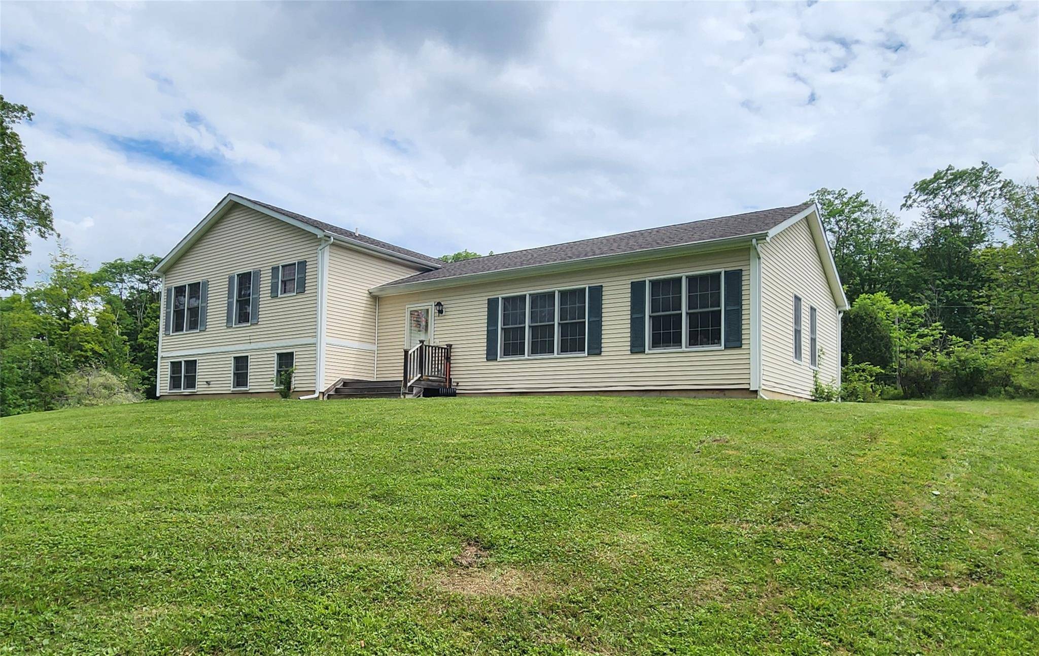 Here is a great opportunity to acquire a beautiful split level home, on 2 acres of land.