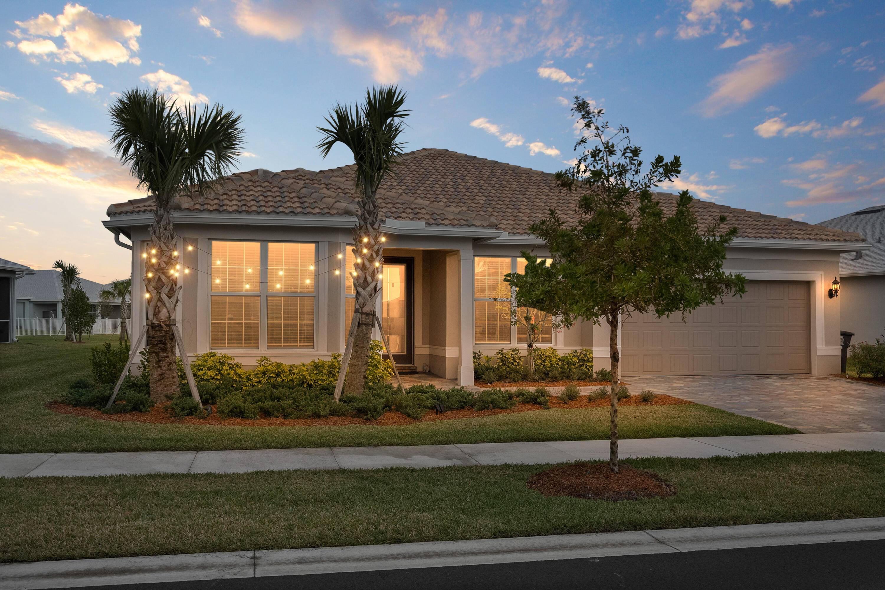 Welcome to the total package in the coveted gated community of Heron Preserve at Tradition !