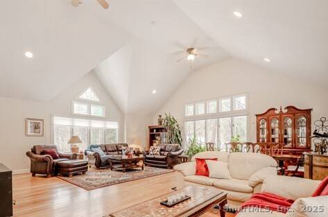 This stunning four bedroom Colonial with contemporary flair sits on 2.