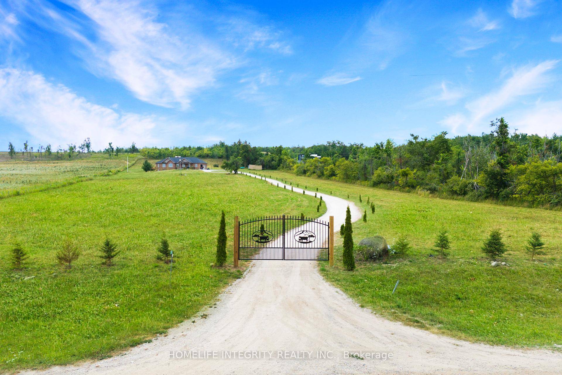 Experience the beauty of country living in this 2015 custom built home, nestled on 13.