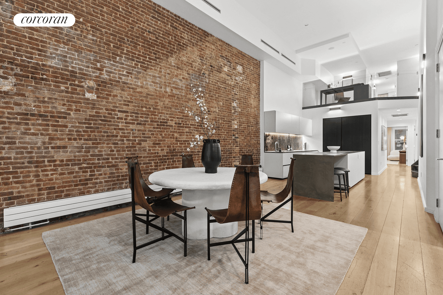 Nestled in the heart of Tribeca, this remarkable triplex conversion residence offers an exceptional blend of modern convenience and classic New York City style.