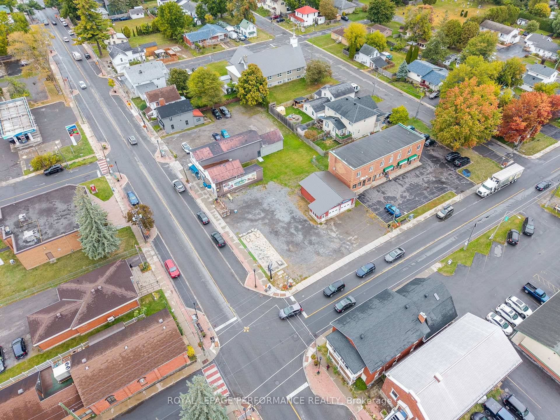 New roof Sept 2025 Located on the extremely visible main corner in the growing town of Russell, this versatile property offers an exceptional opportunity for a variety of buyers.