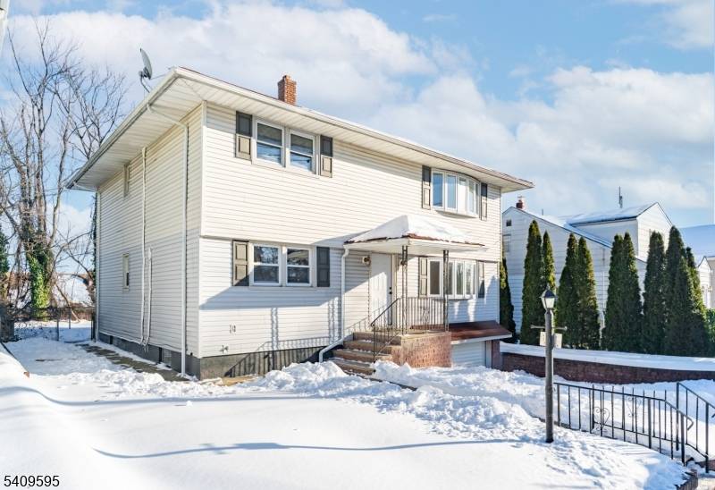 Beautifully renovated two family home located at 263 267 E 25th Street in Paterson, NJ, offering a total of 7 bedrooms and 3 full bathrooms across spacious, well designed units.