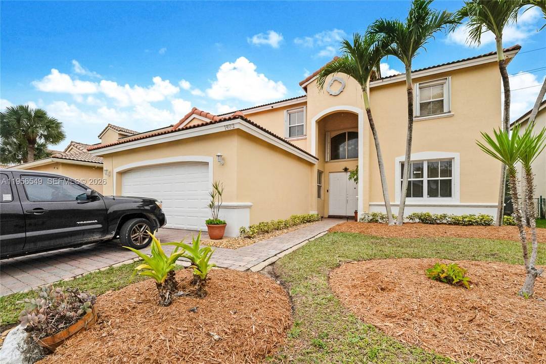 Well maintained home located in Homestead, Florida, featuring a functional layout and bright, expansive living spaces with soaring double height ceilings.