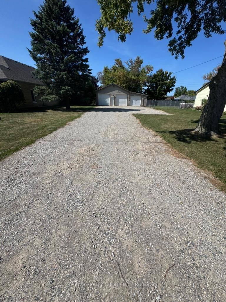 Vacant Residential Lot with Shop Kerwood, Ontario Opportunity awaits with this 66 ft x 132 ft lot located in the quiet community of Kerwood, just minutes from Hwy 402 for ...