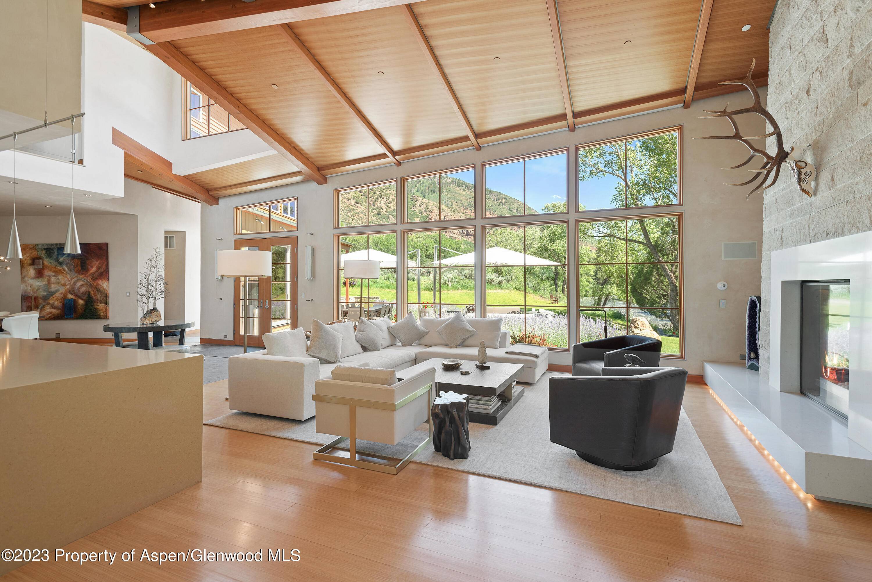 Riverfront Masterpiece.. positioned perfectly along the Roaring Fork River, this contemporary masterpiece is the ultimate riverfront mountain oasis.