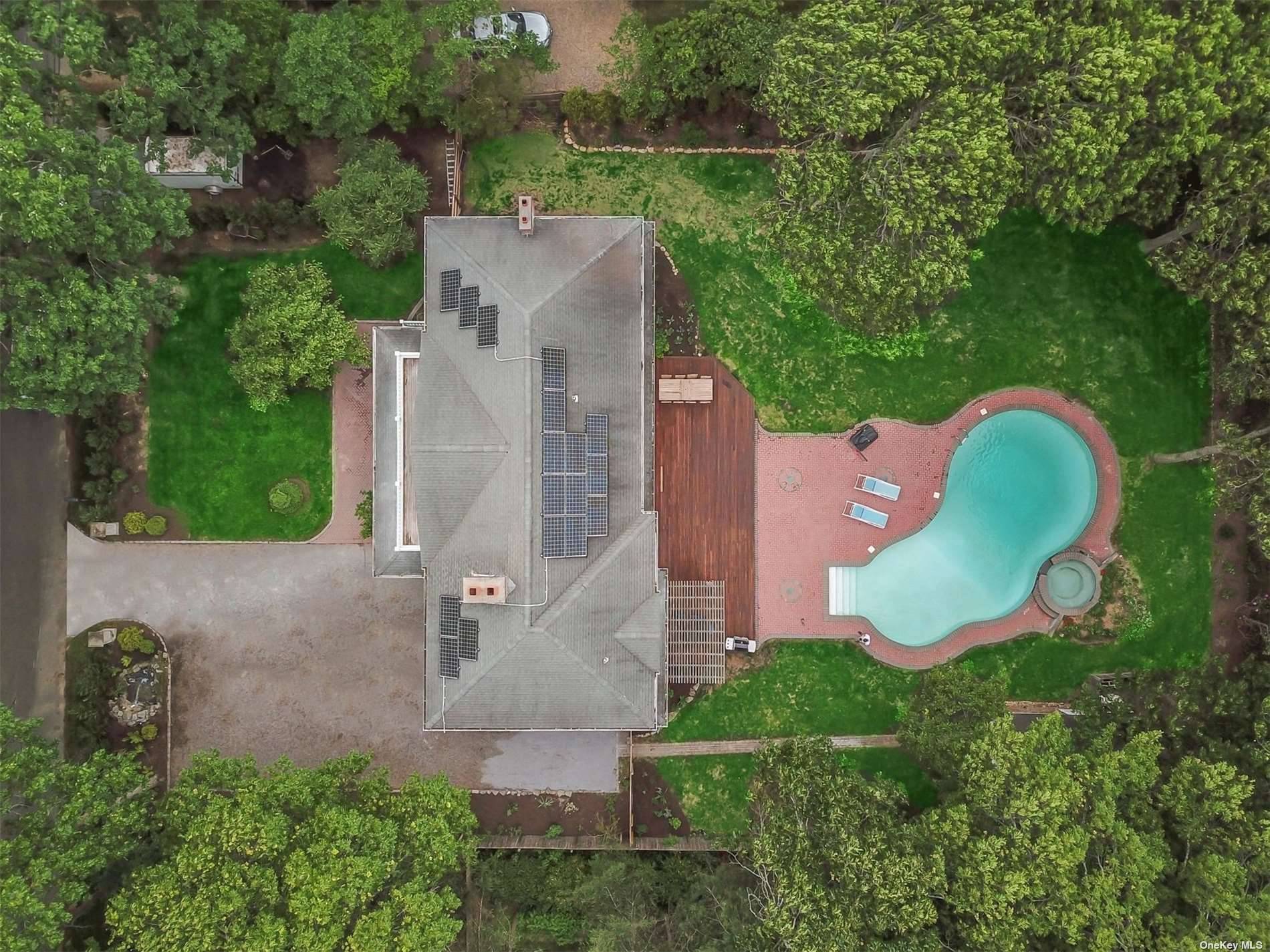 SUMMER IN THE HAMPTONS Inside this spacious 5 bedroom home you'll find an entertainer's paradise with a sun soaked open concept kitchen.