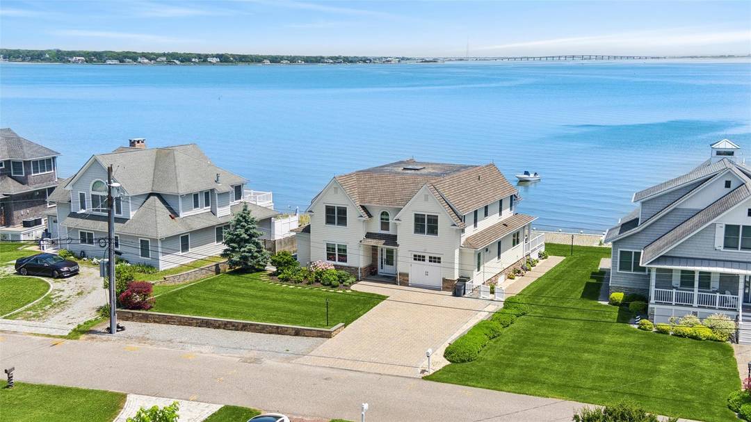 Experience the perfect blend of comfort, luxury, and waterfront living in East Quogue.