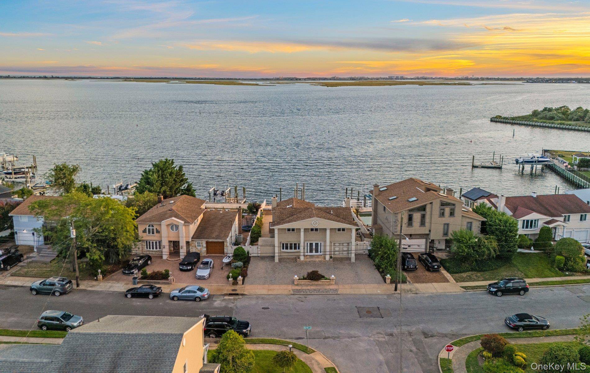Nestled on the open bay in Baldwin, this stunning 4 bedroom, 2.