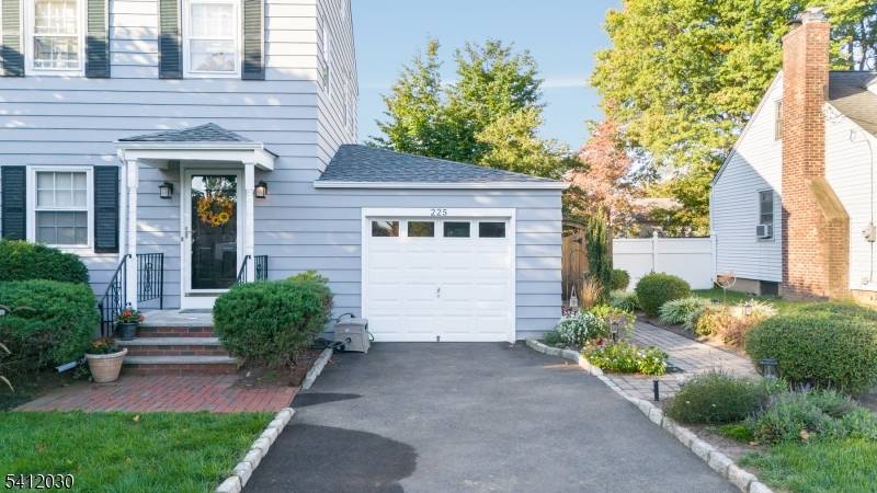 BEAUTIFULLY LANDSCAPED, LOVELY LAWRENCE AVE HOME, PRIVATE AND PRISTINE ON WEST END OF NORTH PLAINFIELD !