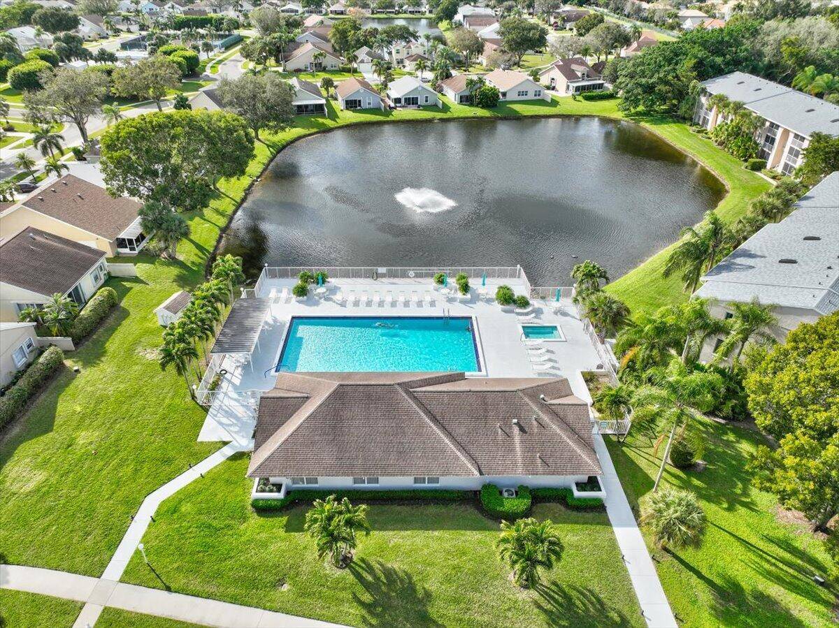 This meticulously kept 1st floor condo offers a tranquil retreat with stunning lake views, all within a prime location in Central Delray.