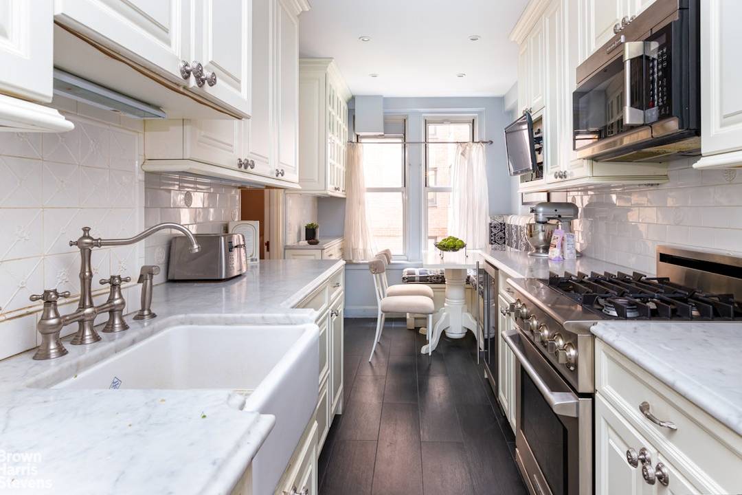 Apartment 3E is a beautifully curated 2 bedroom 2 bathroom prewar residence, with stunning renovated eat in kitchen where enduring style and thoughtful upgrades create a timeless, quietly elevated feel.