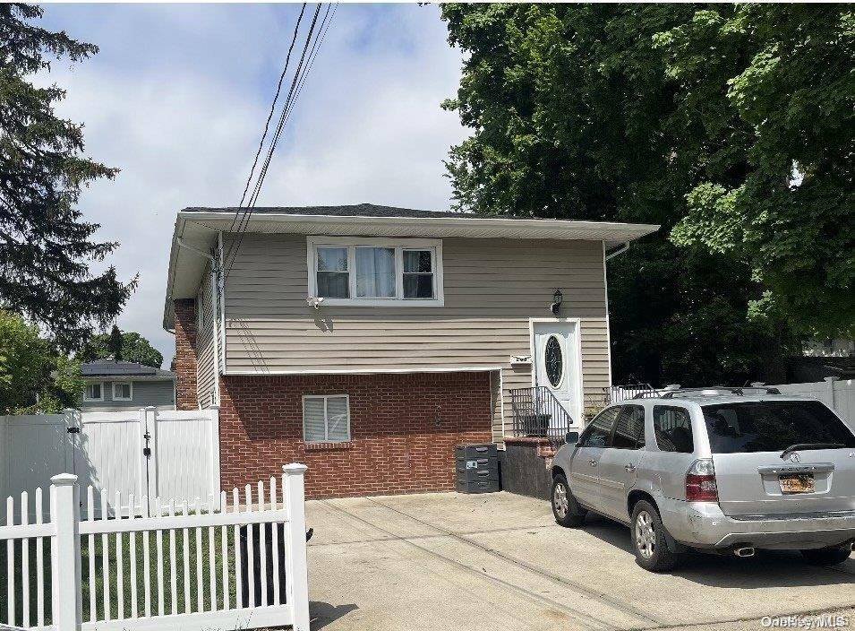 Beautiful Large meticulously kept 6 bedroom, 2 bathroom High Ranch in Westbury, Features Hardwood throughout, Spacious Living Room, Formal Dining Room, Family Room, Private 2 Car Driveway, huge Fenced in ...