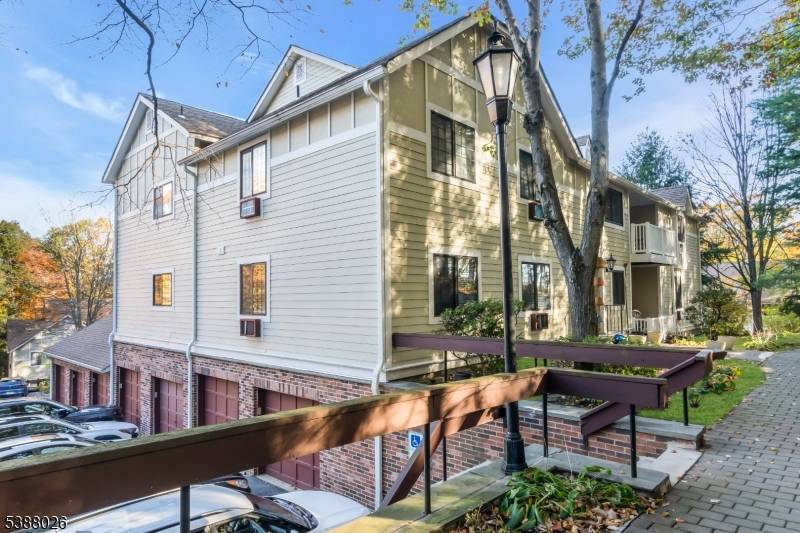 Come see this beautifully maintained 2 bedroom, 2 bathroom condo, featuring hardwood floors and a striking floor to ceiling wood burning stone fireplace.