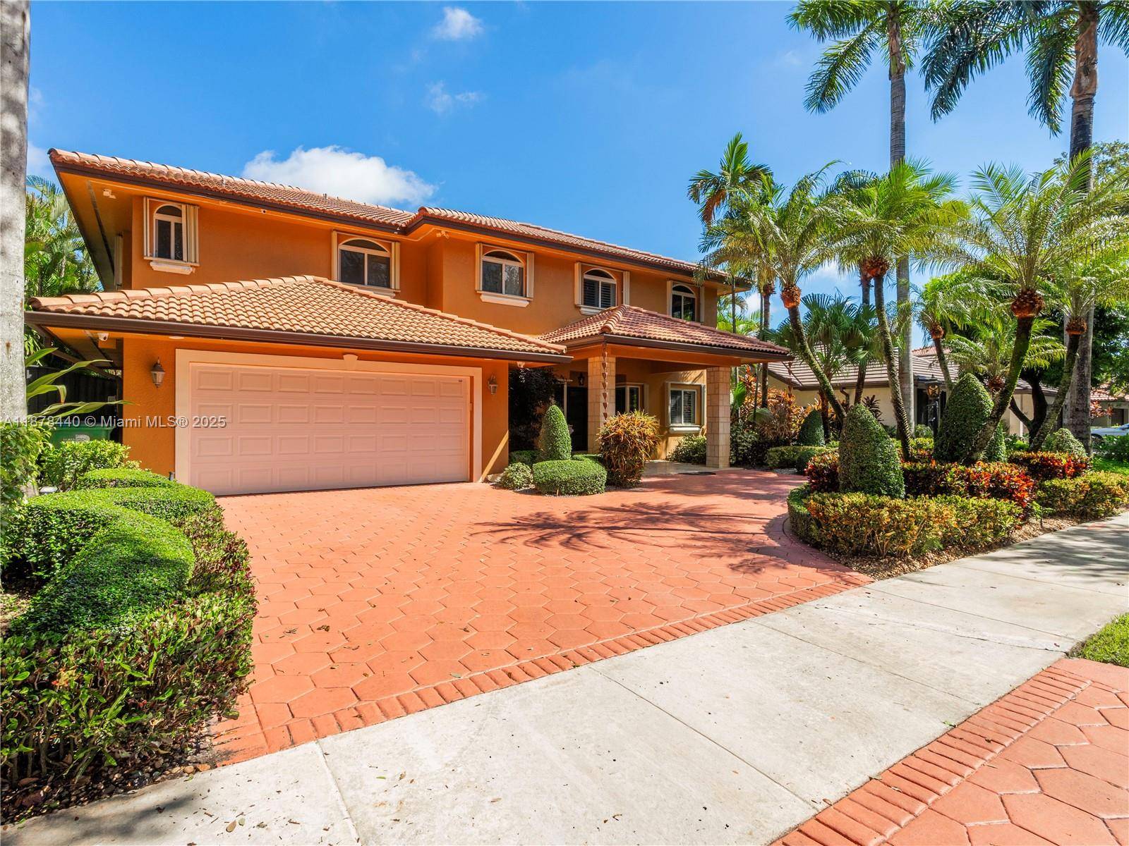 Live in luxury within the gated community of Royal Oaks.