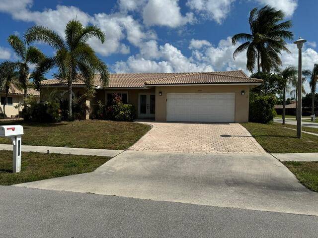 CORNER lot in highly desirable Boca Del Mar !