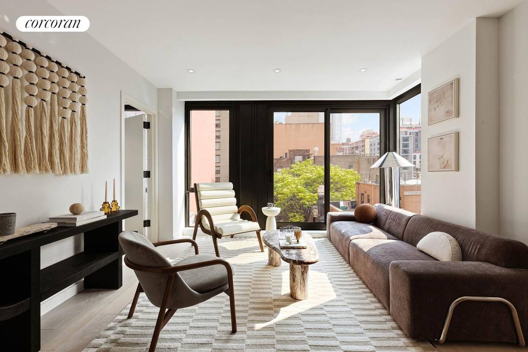355 West at 355 West 39th Street, a boutique condominium offering elegant modern living in the heart of Midtown West.