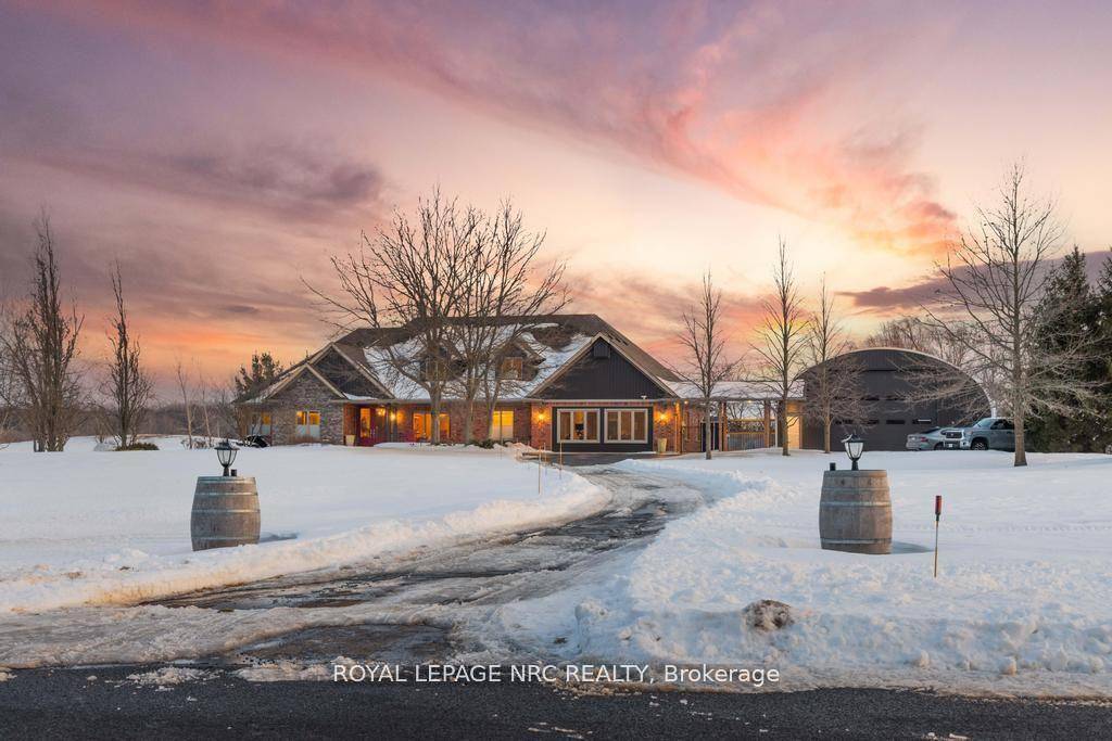 Welcome to this exceptional executive home, where luxury living meets serene countryside charm on a breathtaking 23 acre property in the peaceful Pelham countryside.