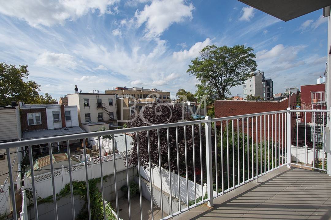 This 1 bedroom, 1 bathroom home is perched on the 2nd floor, facing the rear of this boutique condominium.