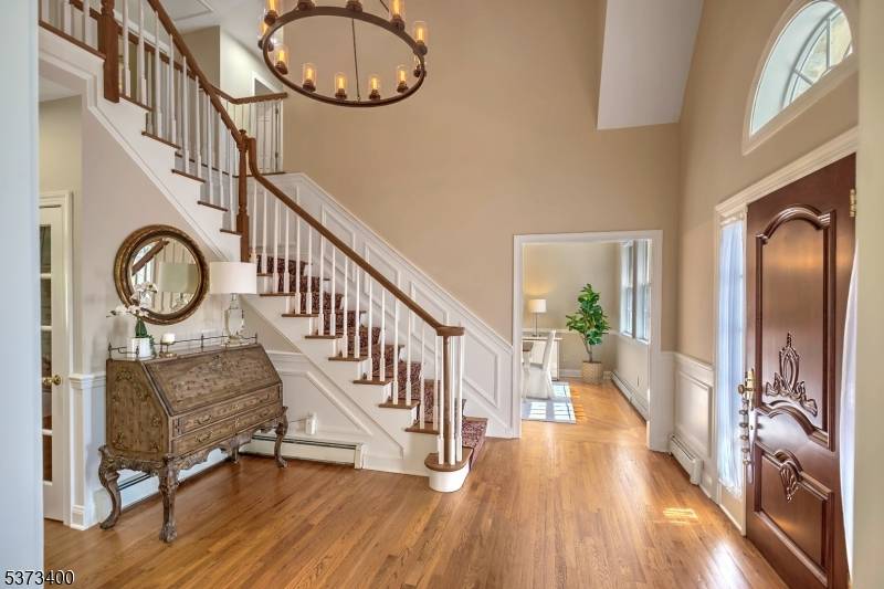 This stately Colonial sits atop a gentle rise in sought after Harding Township, known for its top rated schools and easy access to commuting routes.