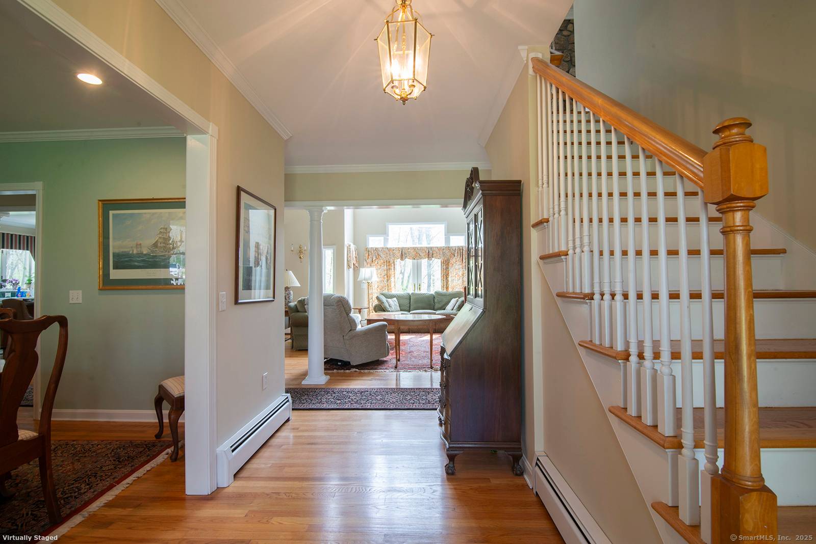 Welcome to this classic New England Colonial home offering a truly fabulous location with privacy yet convenience.
