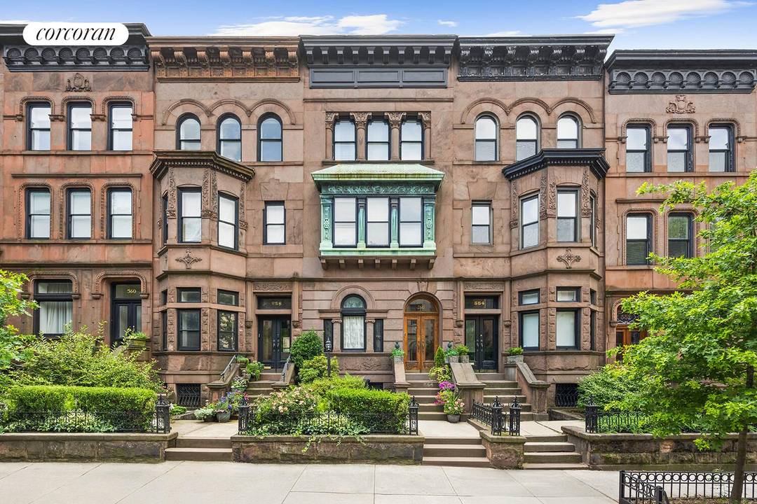 On one of Park Slope's most picturesque blocks, this gracious three story brownstone with English basement offers an exquisite blend of original detail and modern comforts.