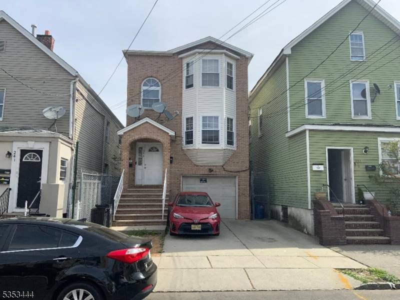 2 apartments with 3 bedrooms living room, dining room, kitchen and 2 baths each floor.