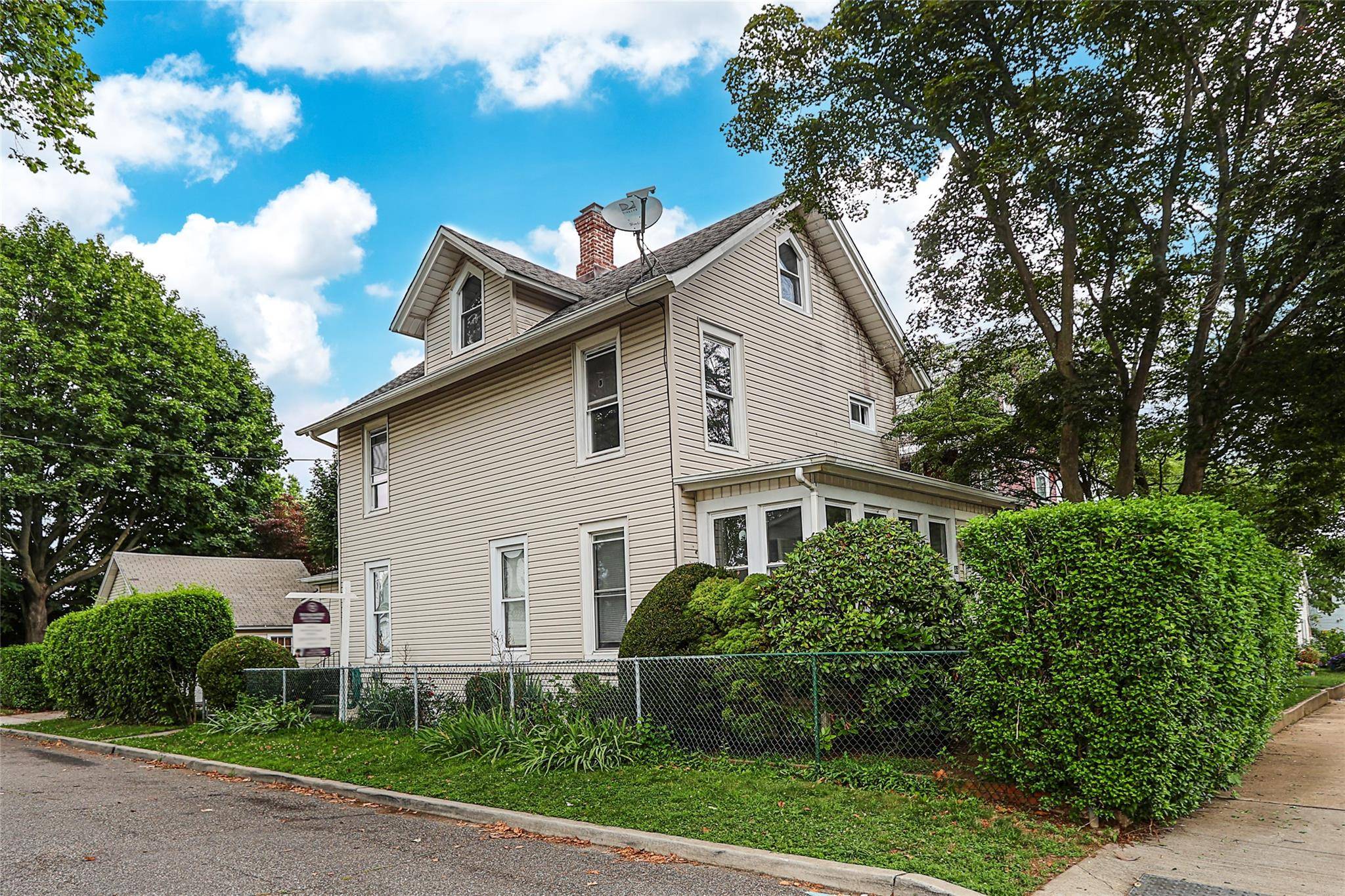 Two Family Home with Bonus Lot and Prime Location !