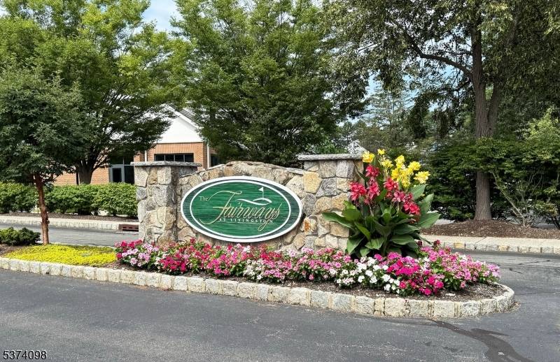 Welcome to this lovely residence nestled within the prestigious gated community of The Fairways in Livingston, where lifestyle and luxury meet.