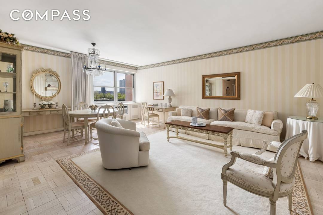 Residence 4I at 25 Sutton Place South is a bright, gracious home with stunning, unobstructed views of the East River and a peaceful outlook over the building's landscaped terrace garden.