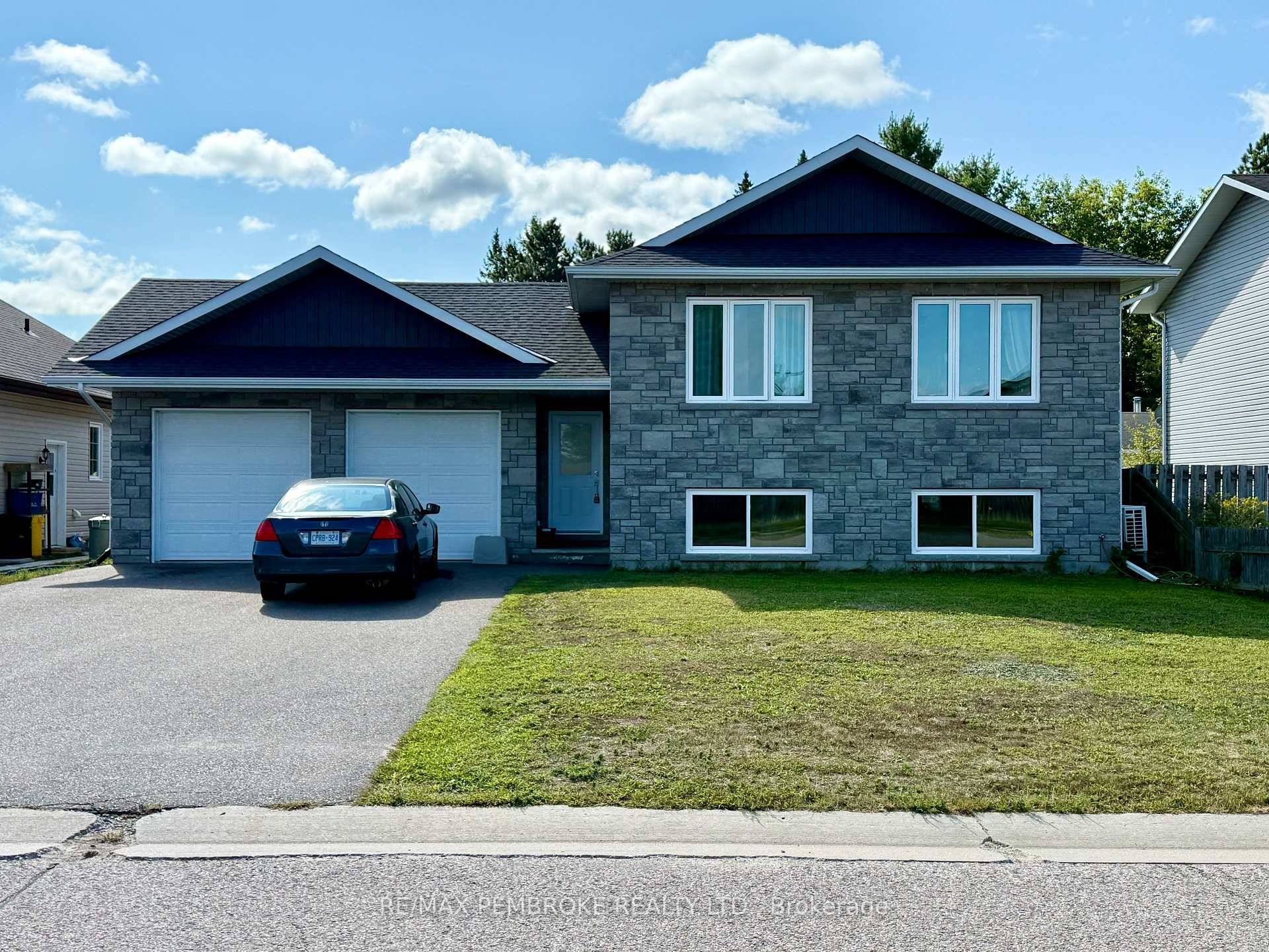 Welcome to this fully tenanted, beautifully designed home with two separate 3 bedroom units, each thoughtfully equipped with its own garage bay.