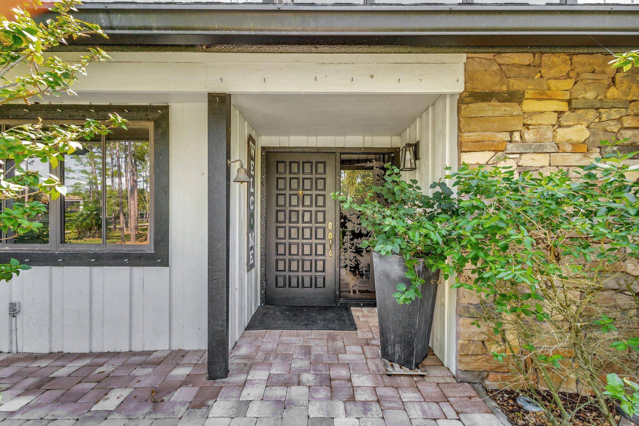 Nestled on 5 serene acres, this estate offers a country feel with modern convenience.