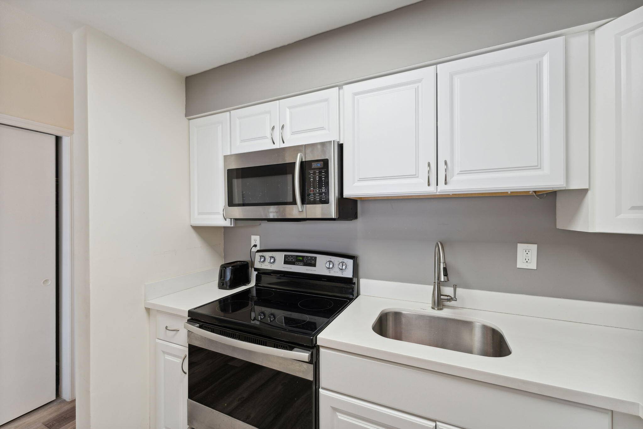 This first floor 1 bedroom 1 bathroom condo, fully furnished, offers an exceptional living experience with its updated and luxurious features.