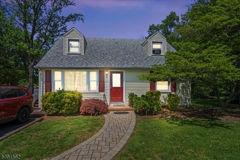 This charming Cape Cod home is a true gem !