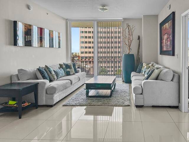 RENOVATED 2 2 in top West Palm building, with new A C, new quartz kitchen and bath counters, high demand north facing comfort.