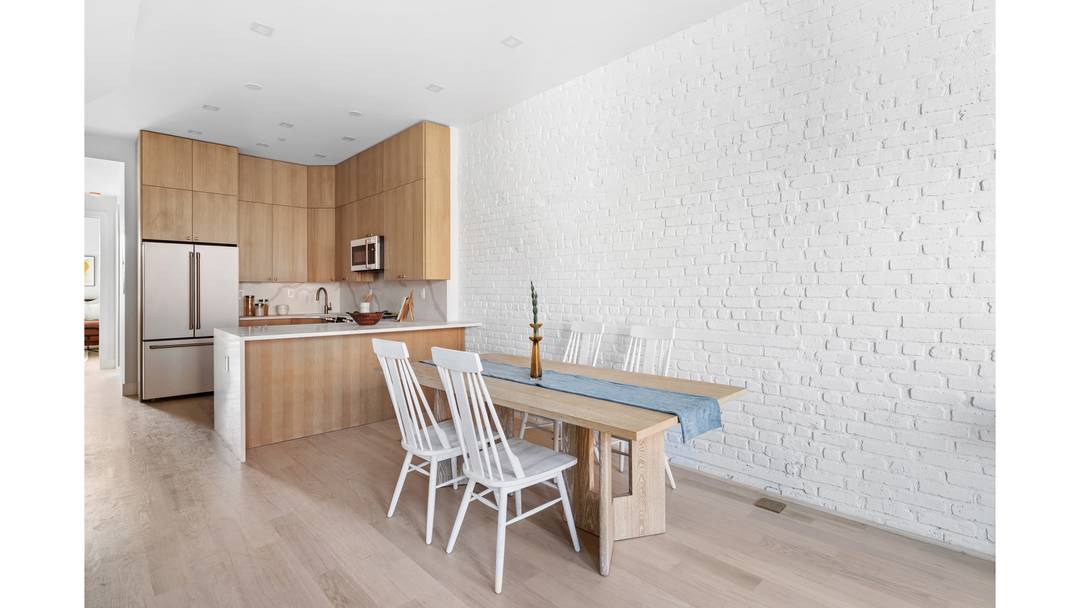 Introducing 112 Luquer Street, nestled in the vibrant heart of Carroll Gardens !