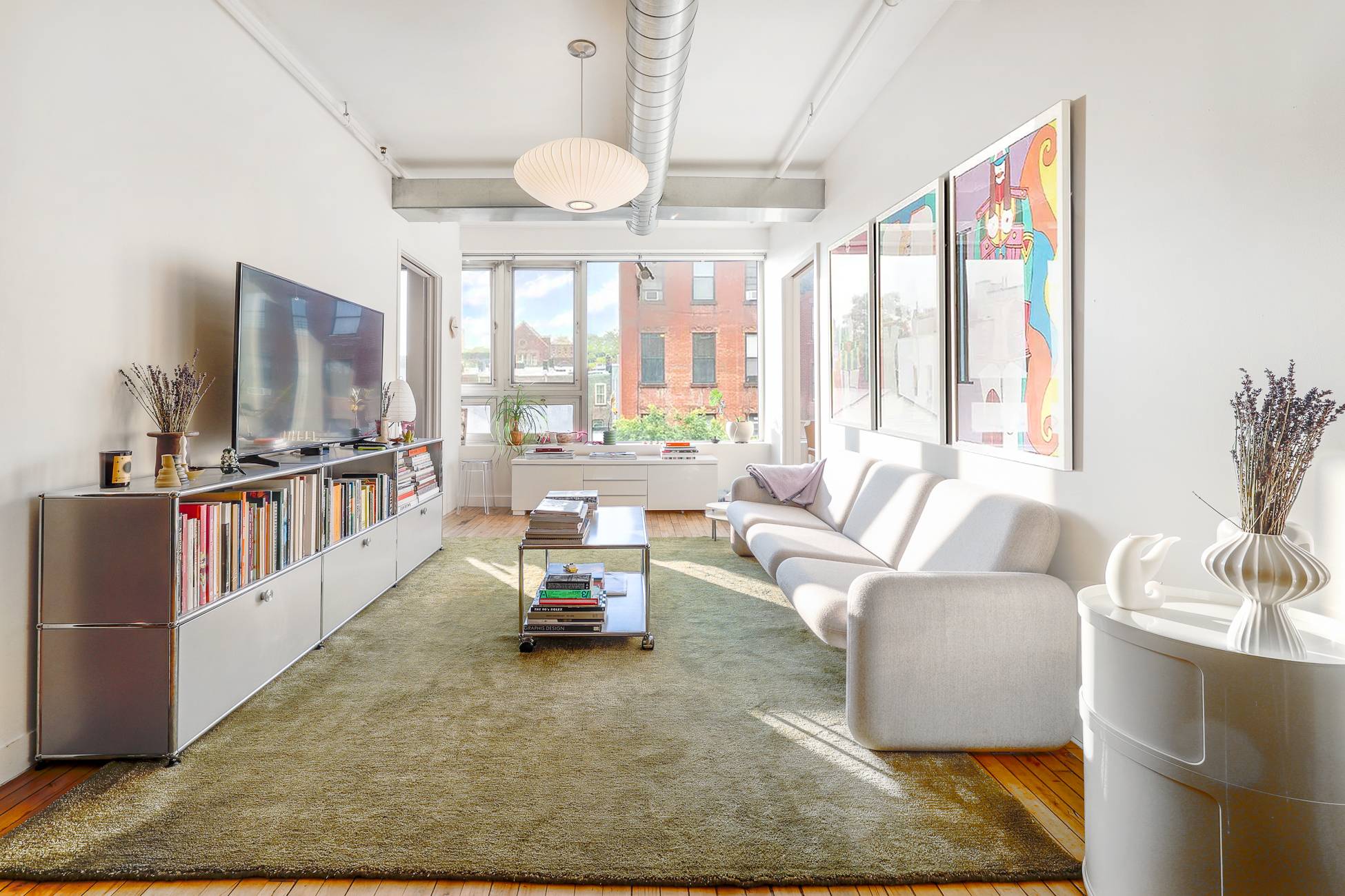 Once the home of a trolly factory, this historic property retains much of its original character and industrial roots.