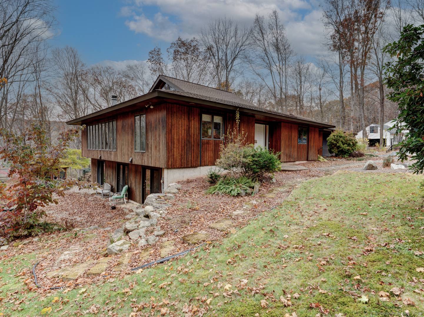 WOW is sure to be the first thing you say when you enter this unique Post and Beam Contemporary home with passive solar.