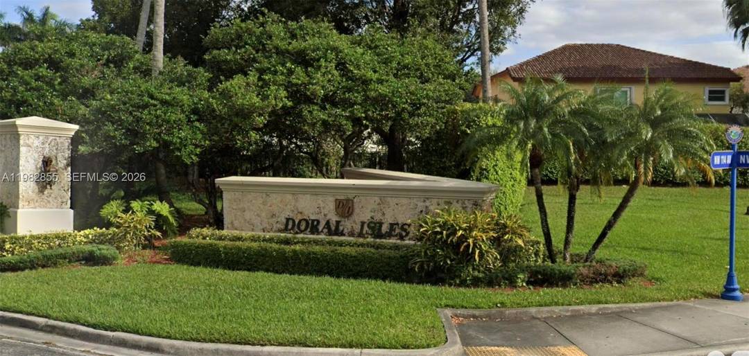 Experience refined living in this elegant 3 bed, 2 bath residence located in the prestigious community of Doral Isles.
