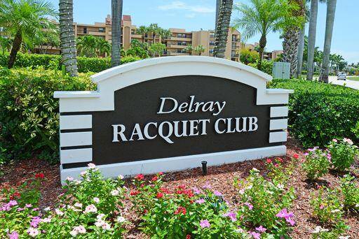 OVERLOOKING THE GARDEN AND TENNIS COURTS THIS SPLIT PLAN 2 BEDROOM 2 BATH, UPDATED, CONDO IN ALL AGE COMMUNITY.
