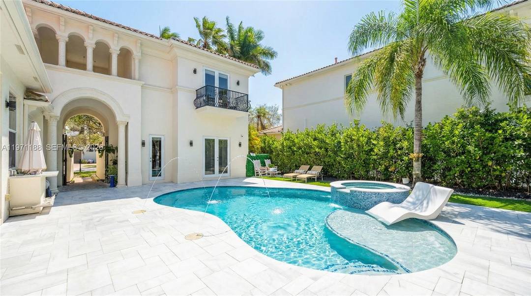 Beautiful two story courtyard estate in the guard gated community of The Oaks, Boca Raton the only home currently on the market with a pool centered courtyard AND direct lake ...