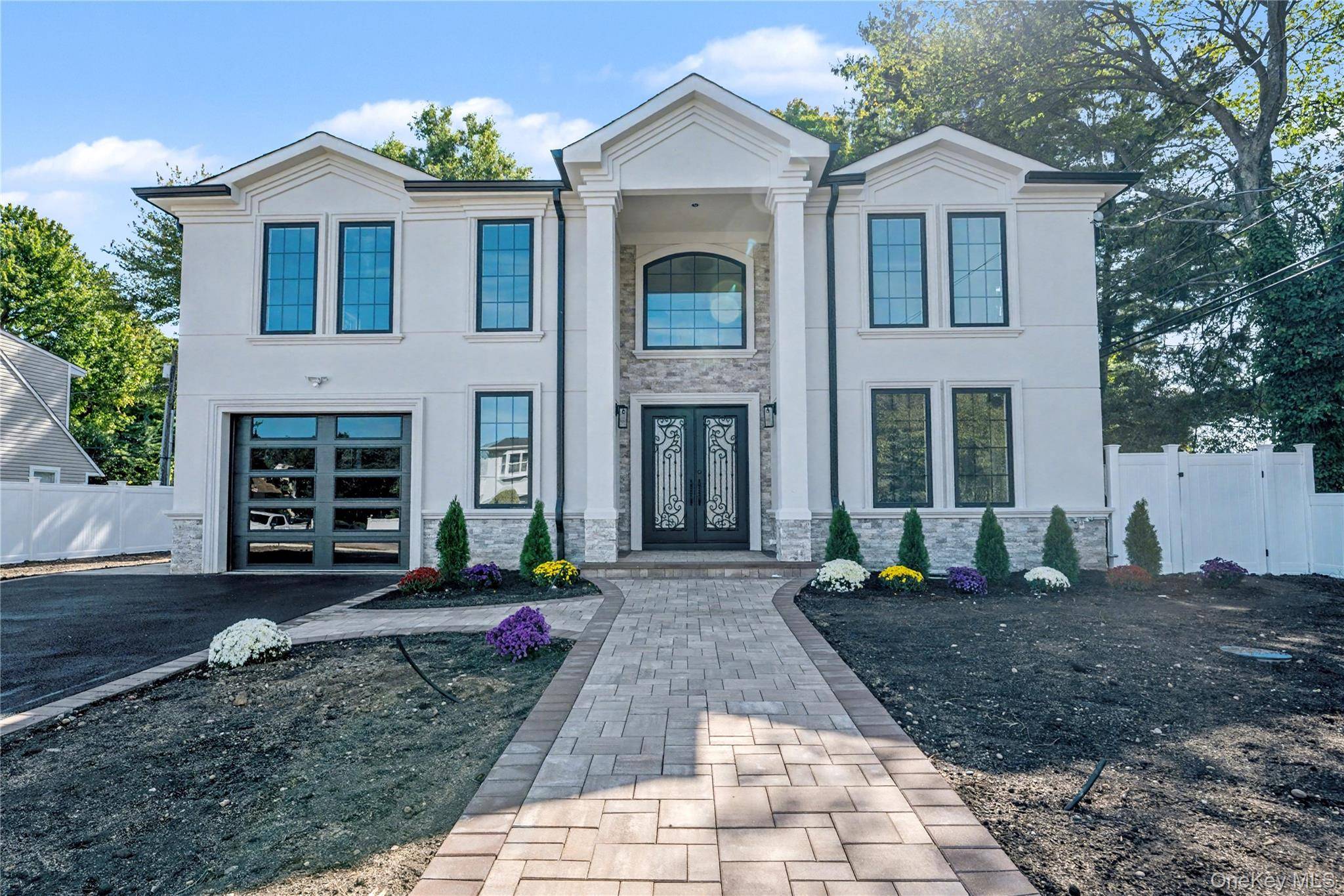 Welcome to this stunning Colonial featuring 5 spacious bedrooms and 4.