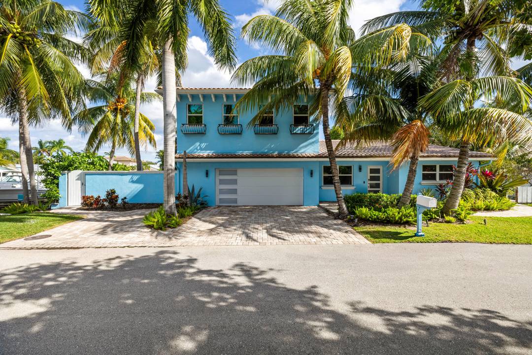 Experience elevated waterfront living in this extensively renewed 5 bedroom, 4 bath home set within the sought after Hypoluxo Pointe neighborhood.
