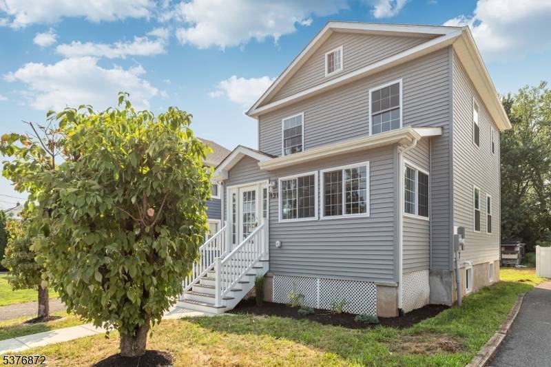 Welcome to this stunning home that has been completely rebuilt from the basement up, offering the perfect blend of modern comfort and timeless style.