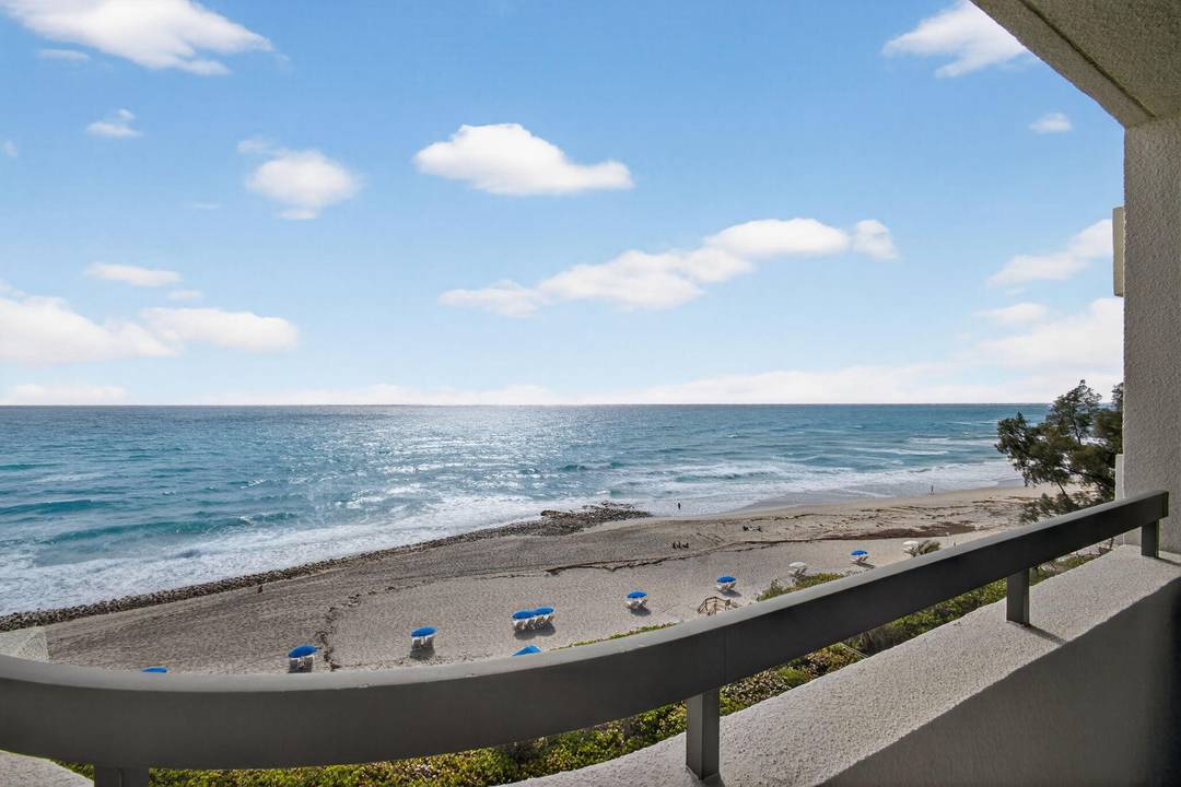 Highly desirable and rarely available direct oceanfront residence in Martinique II Singer Island.