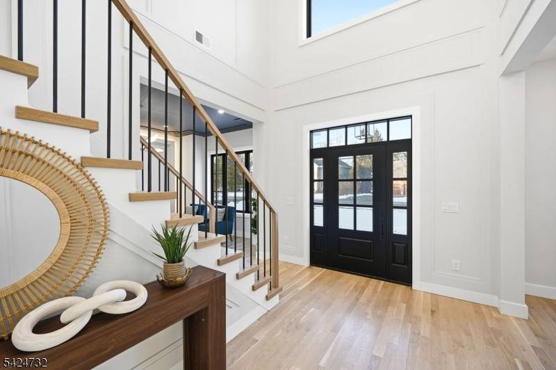 A masterclass in modern luxury, this exceptional NEW CONSTRUCTION Center Hall Colonial offers 6 bedrooms and 6.