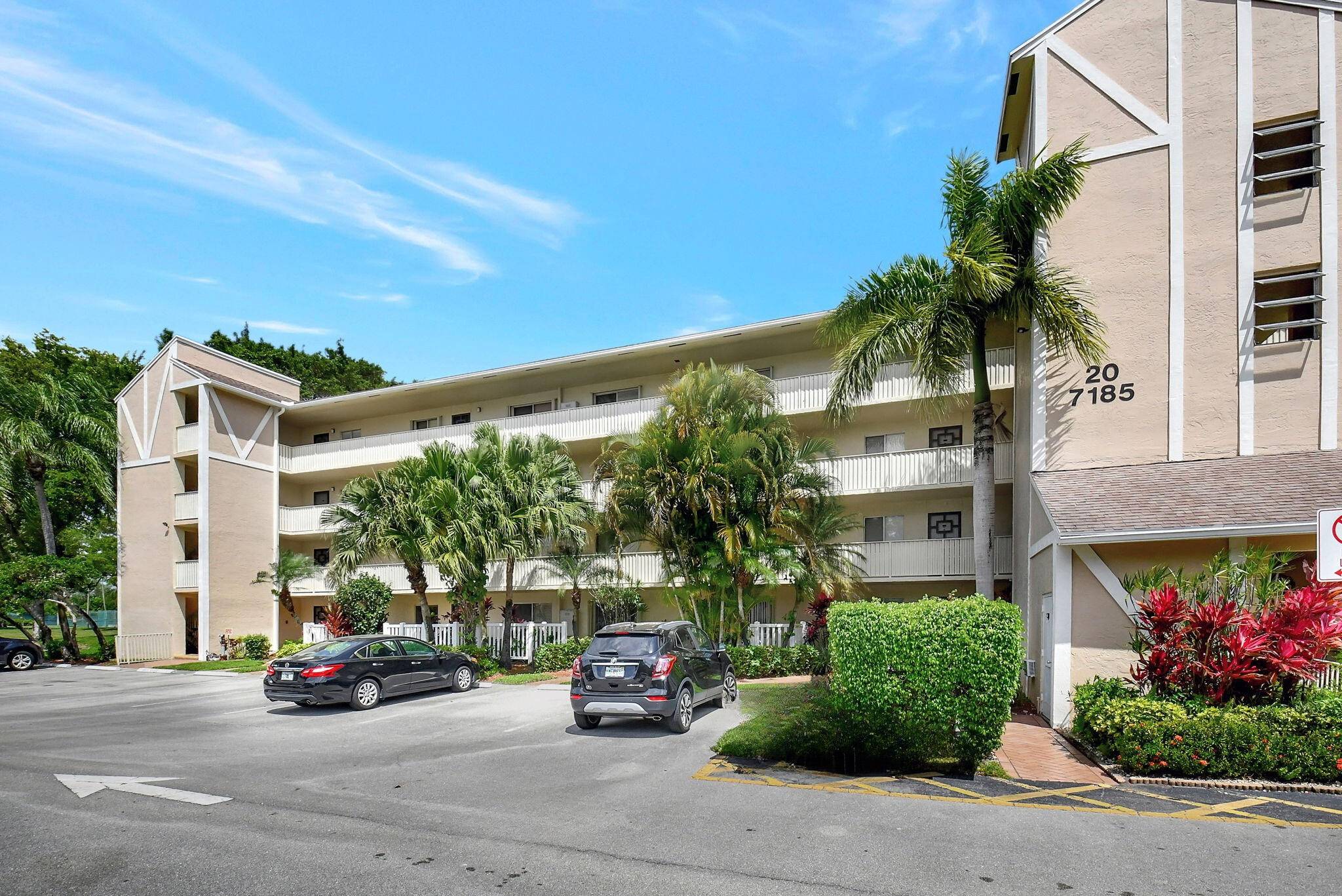 No obstructed views in this meticulously cared for corner unit in Delray's highly desired Huntington Lakes 55 community.