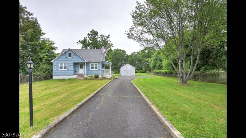 Nestled on just under 1 acre of private, picturesque land, this delightful 3 bedroom Cape Cod home offers warmth, character, and endless potential.