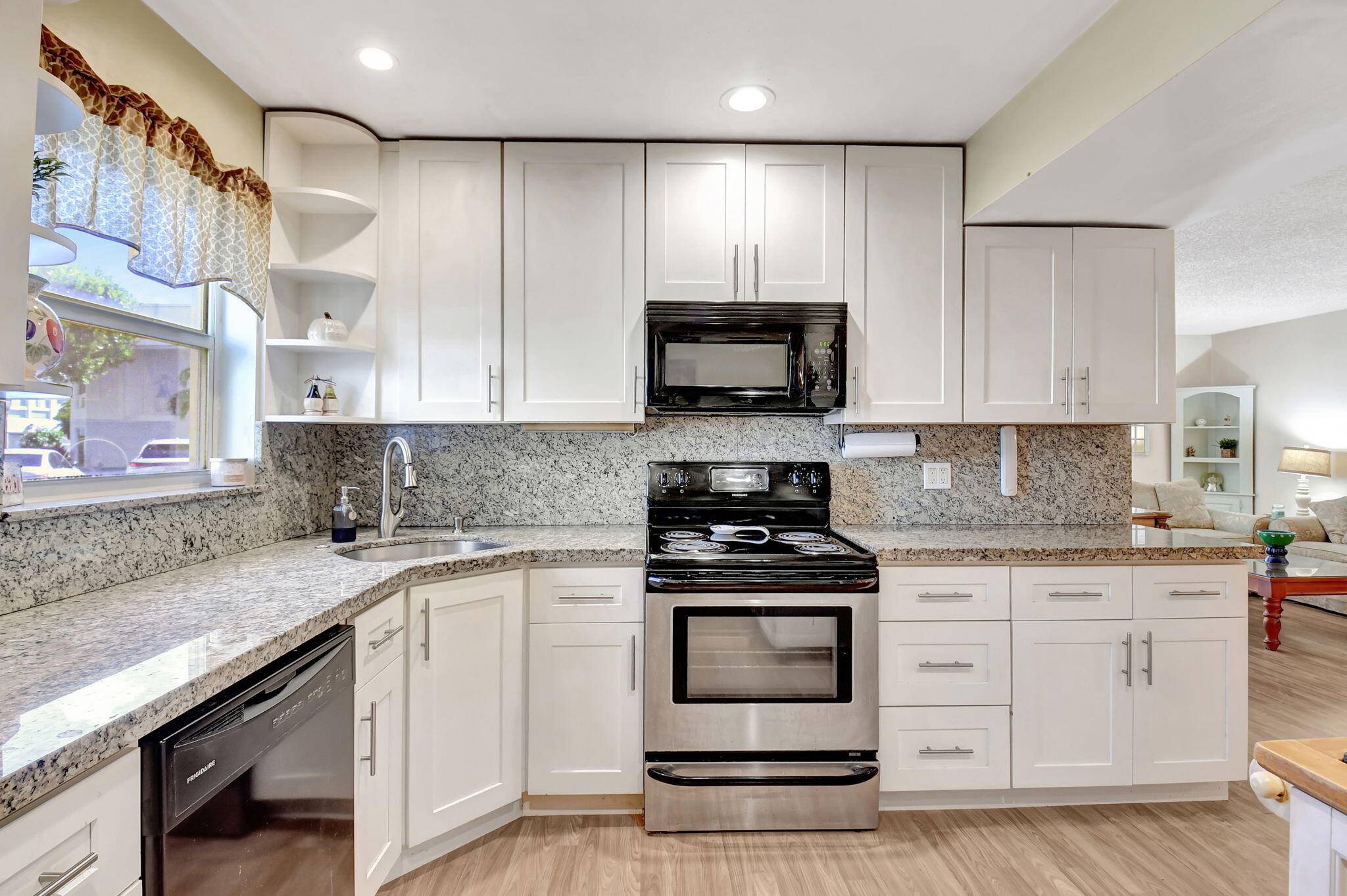 Bring your vision to life in this 1st floor, end corner unit located in the highly desirable Colonial Club, a vibrant 55 community in Boynton Beach.